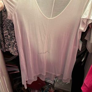 Decree white handkerchief hem top.